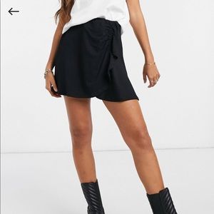 *NWOT* ASOS design mini skirt with ruched detail in washed black